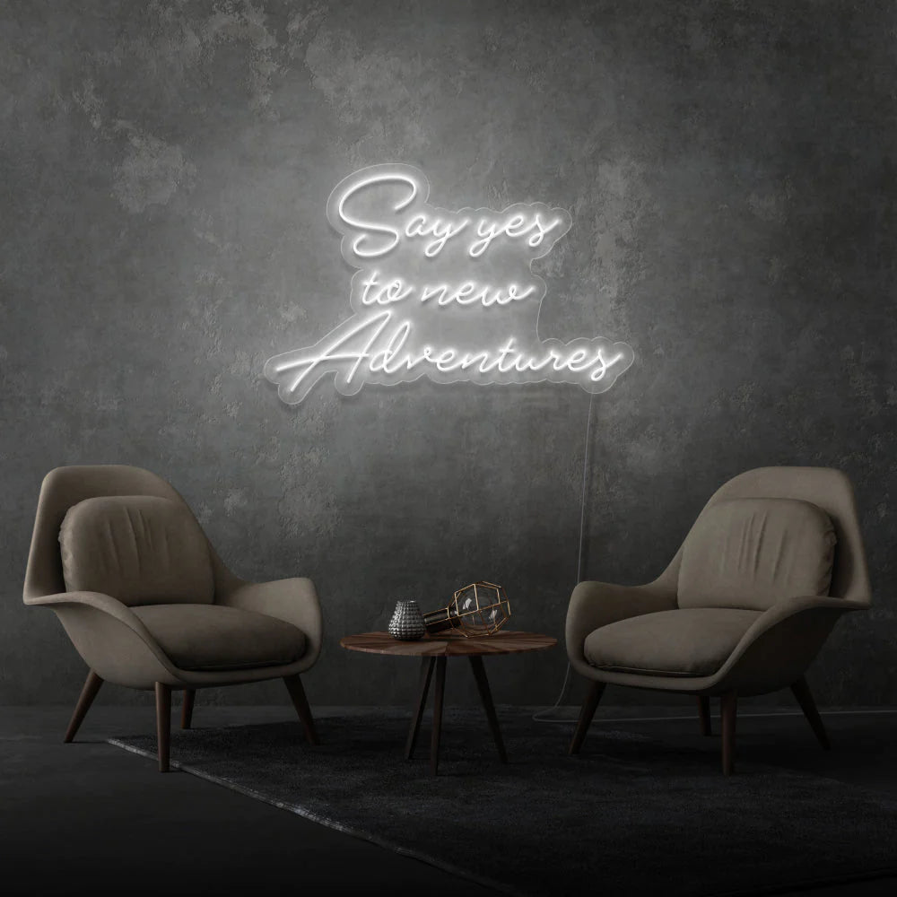 Découvrez notre dernière création chez OPLA DESIGN: l'enseigne néon LED "Say Yes To New Adventures". Personnalisée selon vos préférences, cette enseigne lumineuse apporte une touche unique à votre espace. Idéale pour la décoration néon LED au Maroc, elle est parfaite pour les enseignes de bars, boutiques, restaurants, salons de coiffure, spas et bien plus encore. Avec son éclairage LED, elle offre un éclairage d'ambiance chaleureux et une solution d'éclairage commercial LED efficace