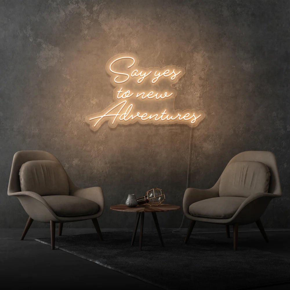 Découvrez notre dernière création chez OPLA DESIGN: l'enseigne néon LED "Say Yes To New Adventures". Personnalisée selon vos préférences, cette enseigne lumineuse apporte une touche unique à votre espace. Idéale pour la décoration néon LED au Maroc, elle est parfaite pour les enseignes de bars, boutiques, restaurants, salons de coiffure, spas et bien plus encore. Avec son éclairage LED, elle offre un éclairage d'ambiance chaleureux et une solution d'éclairage commercial LED efficace