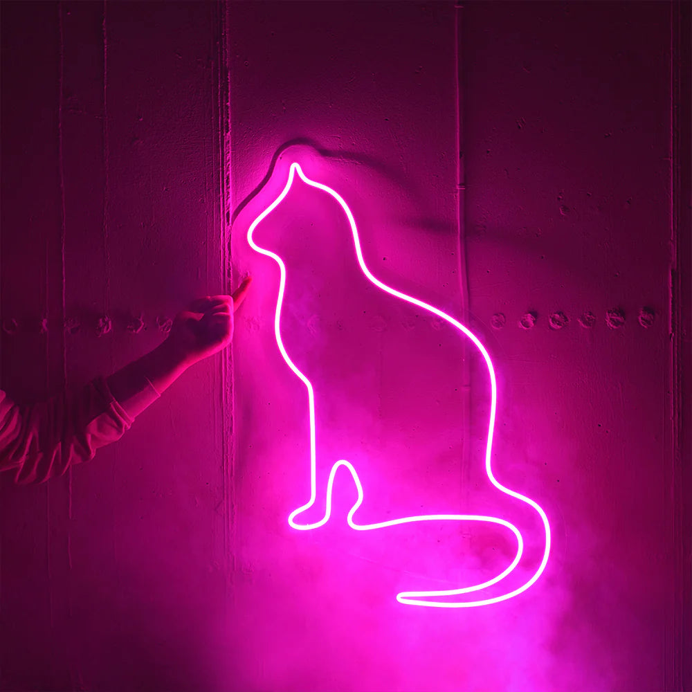 Ajoutez une touche d'originalité à votre décoration avec notre Silhouette De Chat lumineuse en néon LED personnalisée au Maroc. Parfaite pour éclairer votre magasin, votre vitrine ou votre jardin, cette enseigne néon LED peut également être utilisée pour un éclairage d'ambiance, d'accentuation. Offrez-vous une décoration unique grâce à notre éclairage architectural LED, disponible à un prix abordable sur OPLA DESIGN.