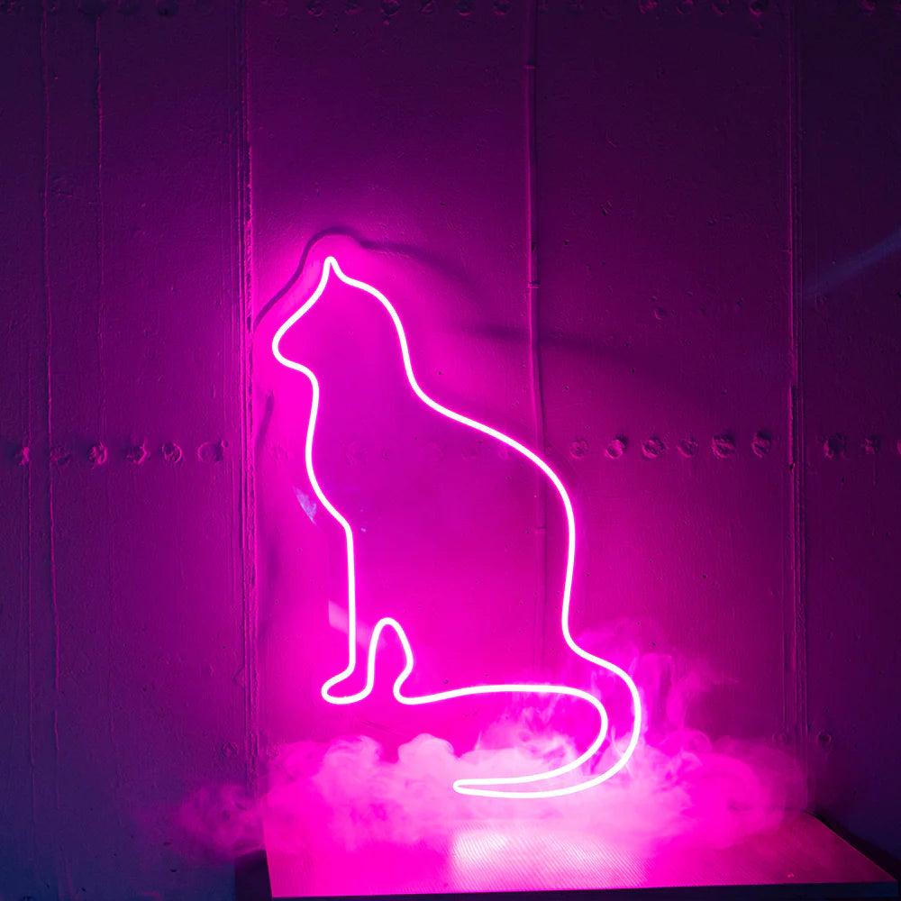 Ajoutez une touche d'originalité à votre décoration avec notre Silhouette De Chat lumineuse en néon LED personnalisée au Maroc. Parfaite pour éclairer votre magasin, votre vitrine ou votre jardin, cette enseigne néon LED peut également être utilisée pour un éclairage d'ambiance, d'accentuation. Offrez-vous une décoration unique grâce à notre éclairage architectural LED, disponible à un prix abordable sur OPLA DESIGN.